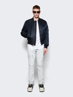Amiri Crystal Logo Distressed Jeans Bleached Indigo